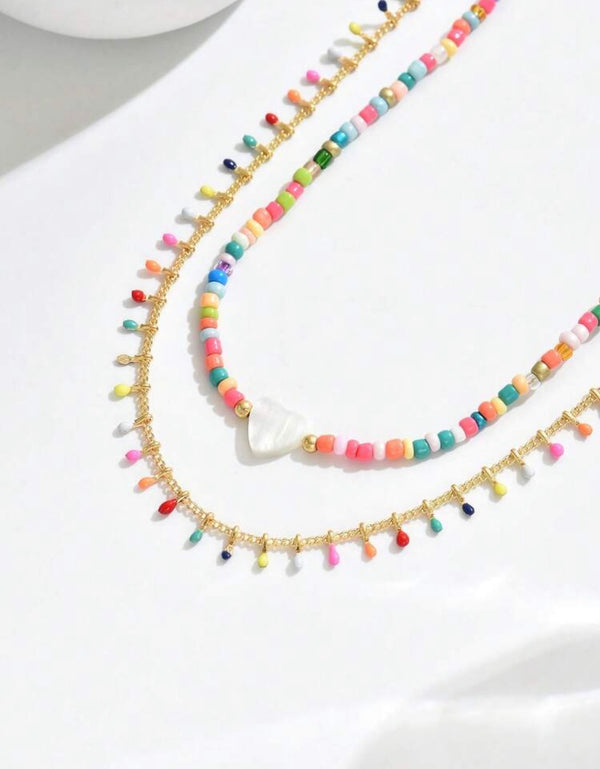 Colorful Beaded Necklace Layered with Gold Charm Chain